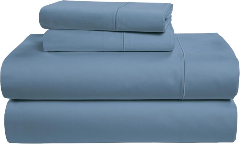 Blue bed sheet set with pillowcases neatly folded