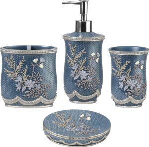 Blue floral bathroom accessory set with soap dispenser, toothbrush holder, tumbler, and matching tray featuring embossed texture and silver trim.