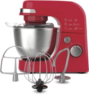 Modern red stand mixer with metal bowl sitting securely on a kitchen counter