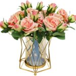 Artificial pink rose arrangement with greenery in gold geometric vase